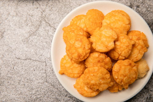 酥脆小米锅巴零食休闲食品美食摄影图 摄影